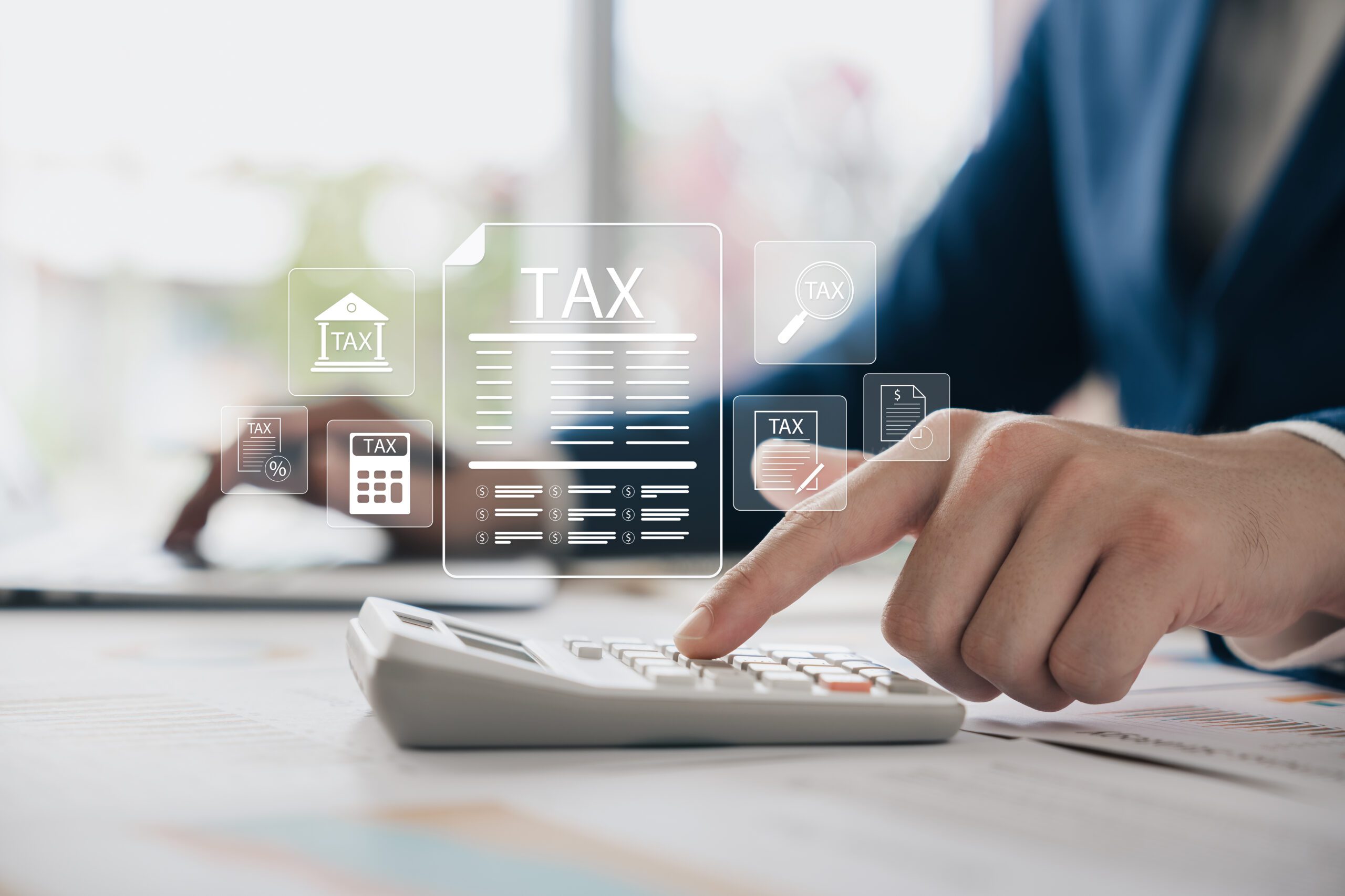 Tax calculation and Double Tax Deduction for Internationalisation (DTDi) concept, showing a professional using a calculator with digital tax icons, for B-Wiz Partners.